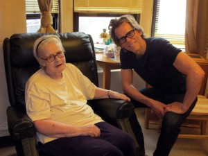 Kevin Bacon smiling with Encore 49 Resident