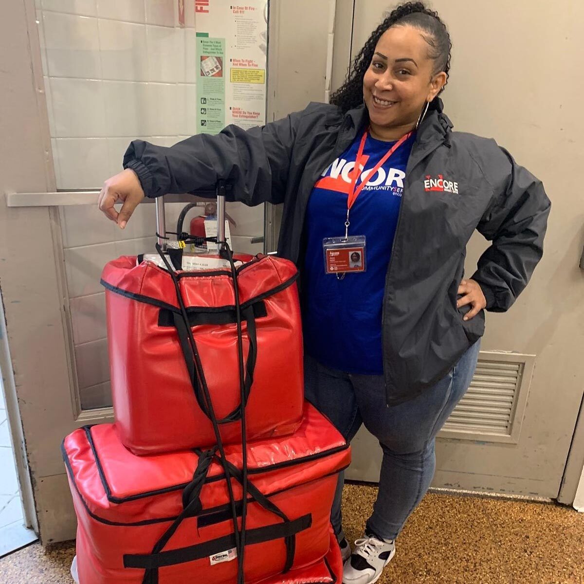 Volunteer delivering meals to seniors for Encore Community Services